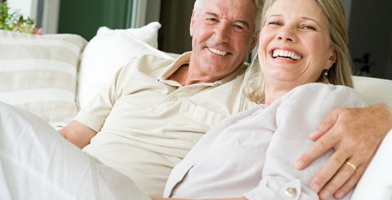 A relaxed older couple at home